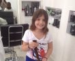 תלמידת כיתה ב' תרמה את שיערה למען ילדים חולי סרטן